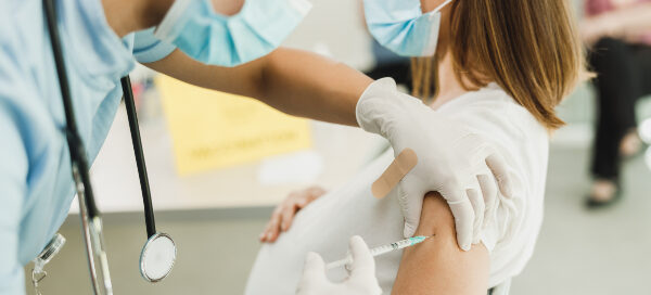 pregnant woman receiving vaccine